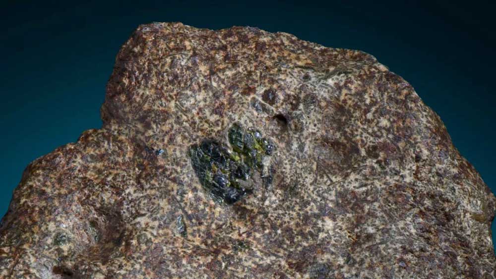 Εικόνα του άρθρου Ανακαλύφθηκε το αρχαιότερο ηφαιστειακό πέτρωμα σε μετεωρίτη